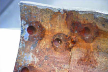 Local corrosion of a galvanized steel pipe